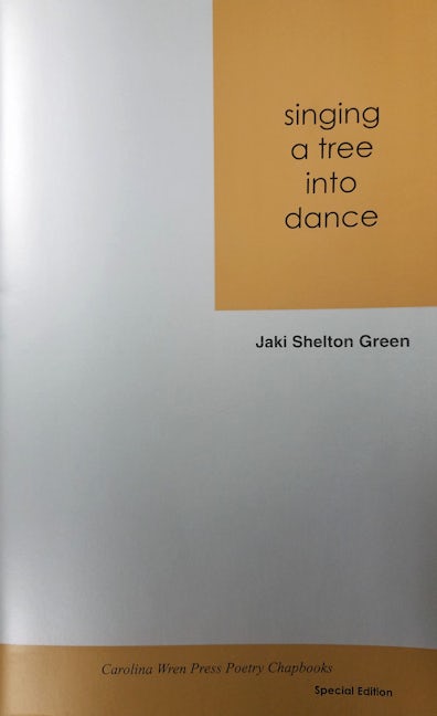 Book cover image for singing a tree into dance ISBN: 9780932112453