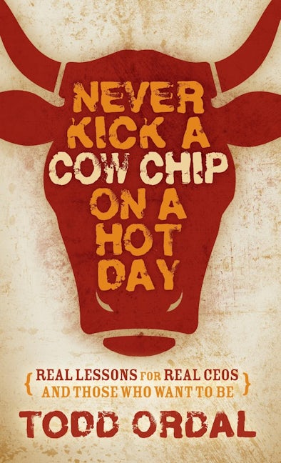 Book cover image for Never Kick a Cow Chip on a Hot Day ISBN: 9781630477226