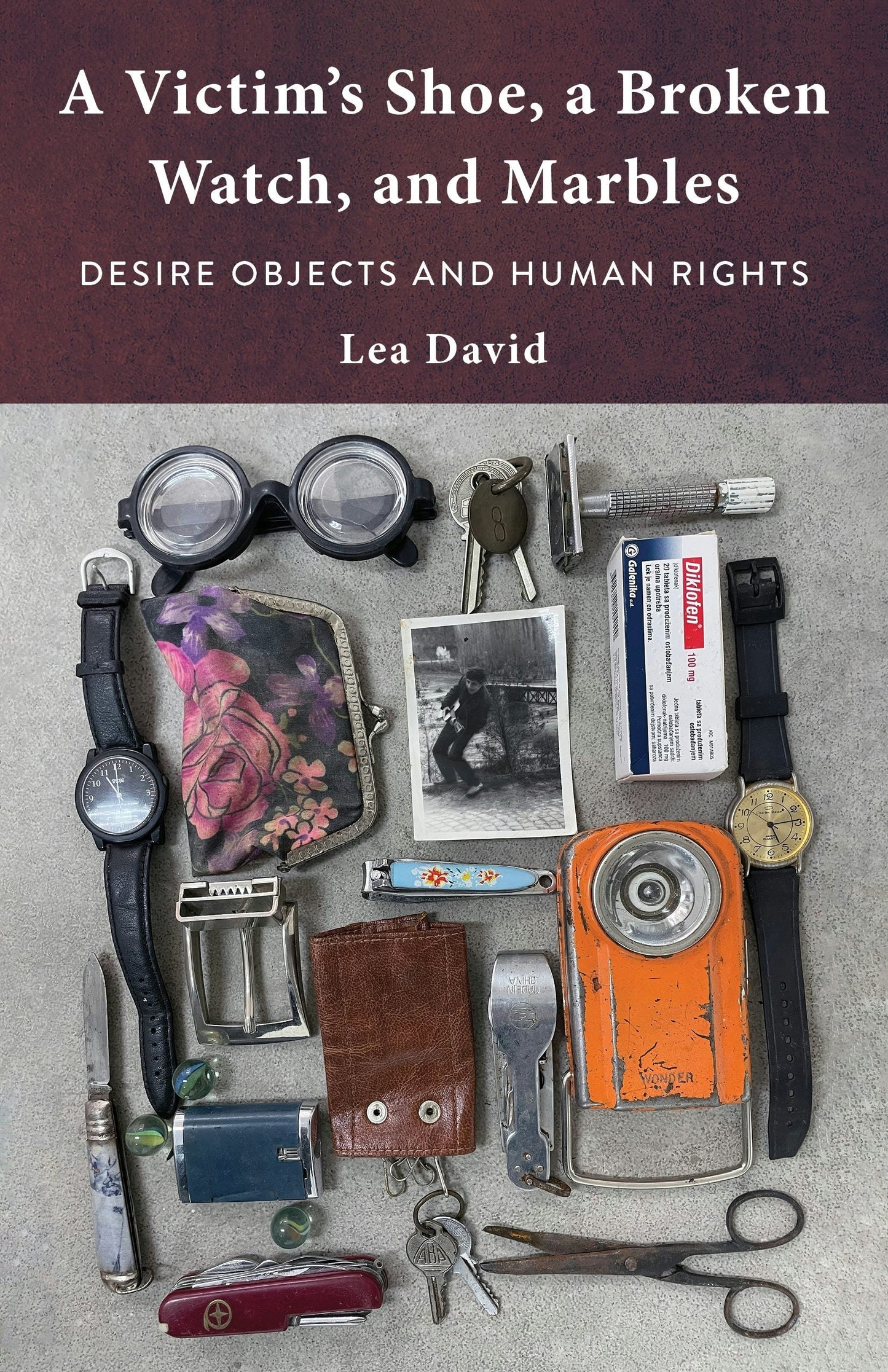 Book cover image for A Victim's Shoe, a Broken Watch, and Marbles ISBN: 9780231217736