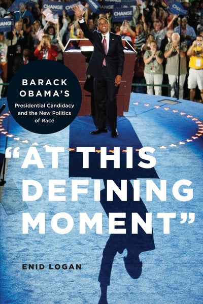 Cover image for “At This Defining Moment”, isbn: 9780814738023