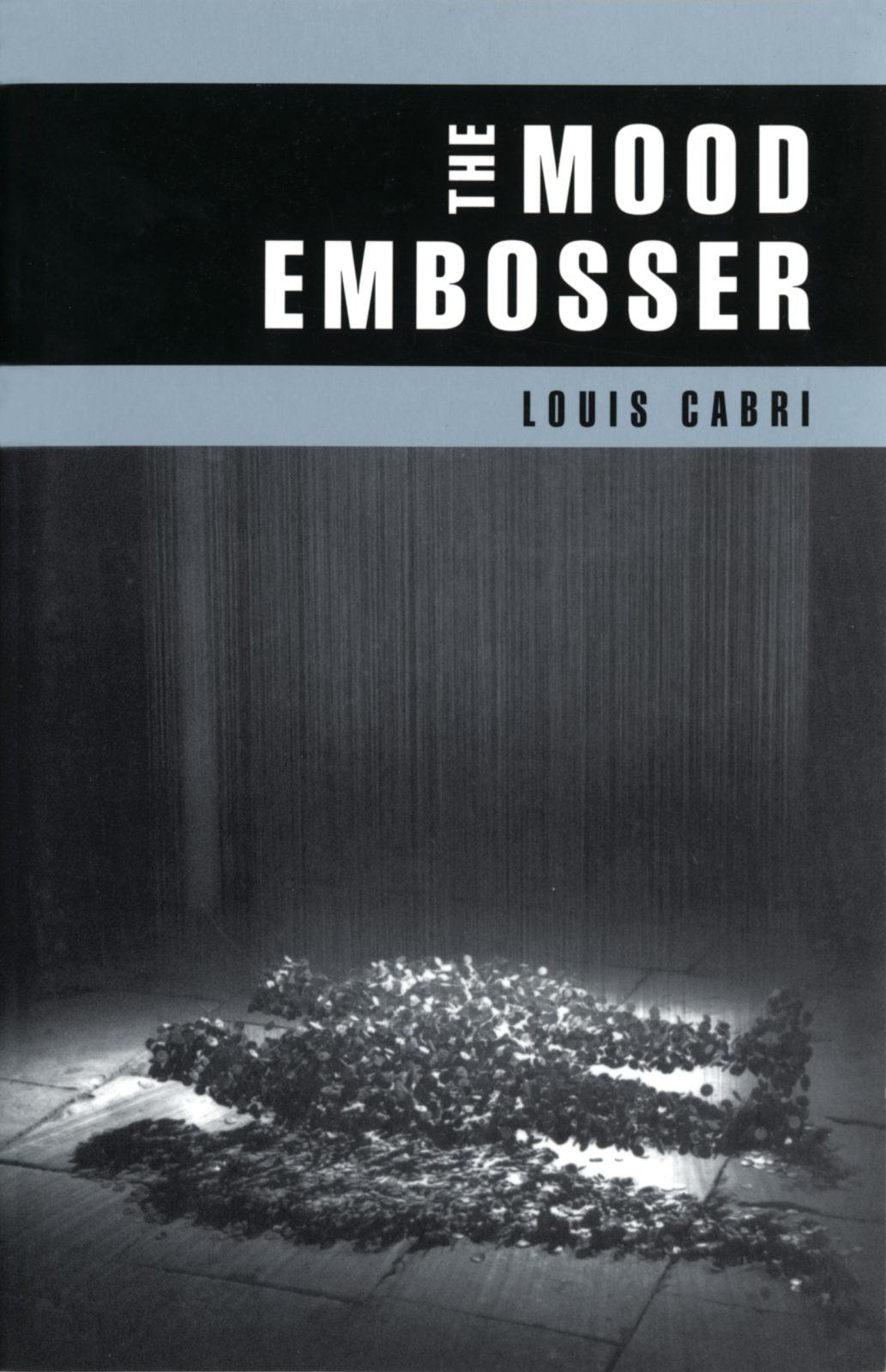 Book cover image for The Mood Embosser ISBN: 9781552450956
